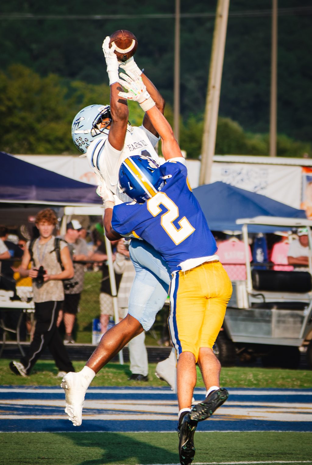 Player leaping for a high catch